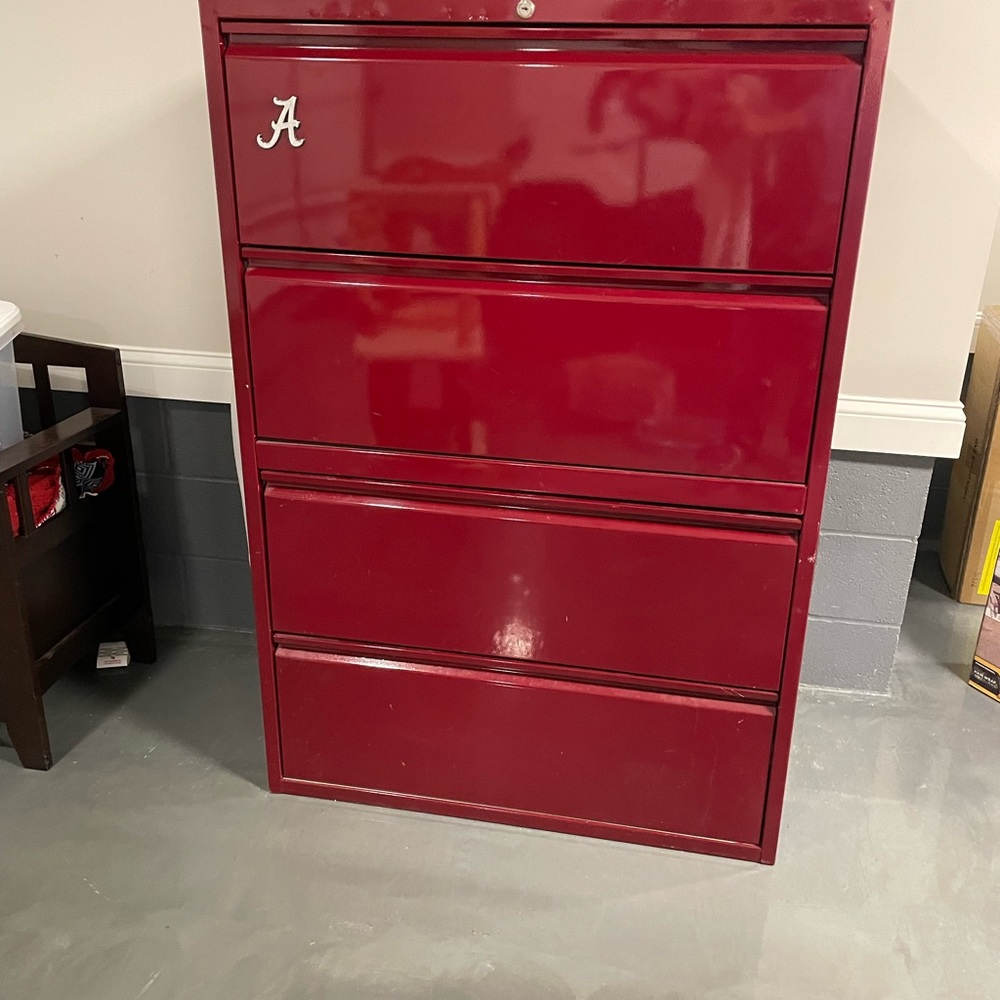 Custom Alabama metal cabinet that is brand new. Excellent condition